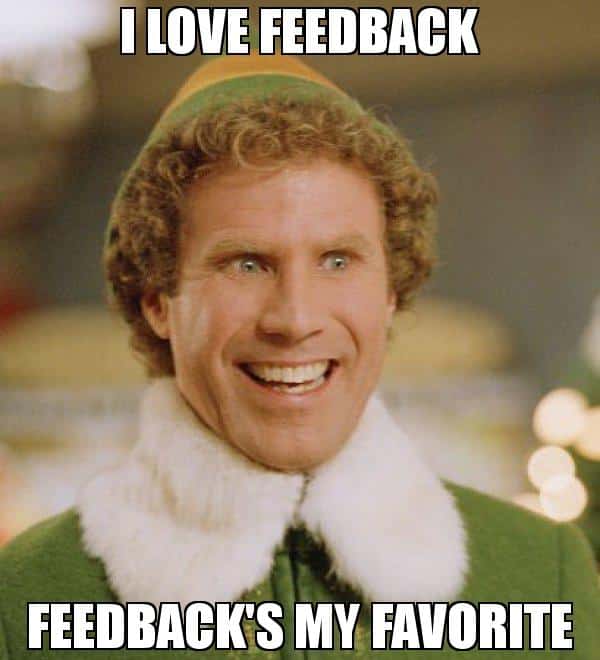 Image of a person smiling and wearing an elf costume. The text above says "I LOVE FEEDBACK" and below says "FEEDBACK'S MY FAVORITE.