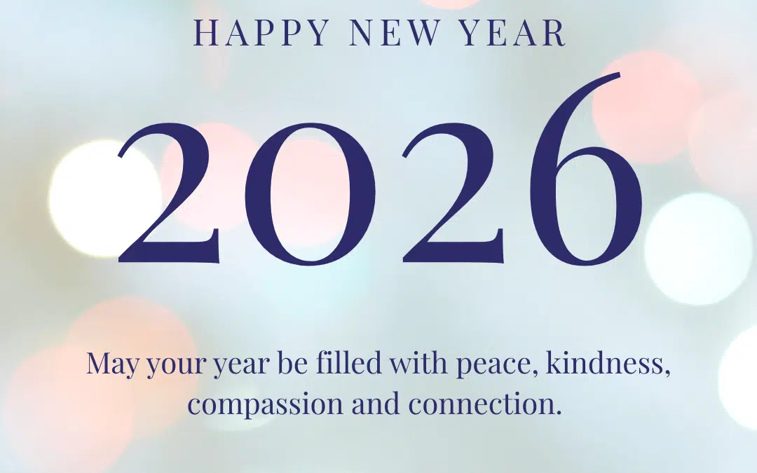 A New Year greeting card for 2026 with a message wishing peace, kindness, compassion, and connection, featuring soft bokeh lights and Encourage OT branding.